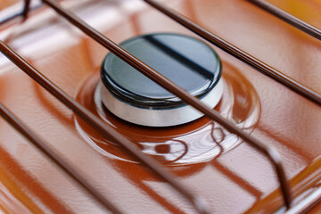 burner on the new compact brown gas stove.