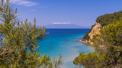 View of Mount Olympus over turquoise waters near Sani, Chalkid