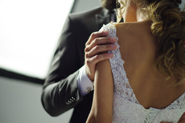 People no face. Photo about loving couple on a wedding day. Closeup body without face. Wedding...