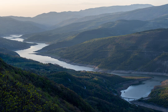 The Kozji Kamen viewpoint offers a beautiful view of Lake Zavojsko, the meanders of the Visocica River and mountain peaks. Serbia near Pirot. Panoramic view of Zavoj lake from viewpoint