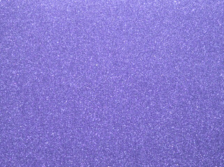 Purple sparkle background. Violet glitter background. Lilac glimmer. Abstract twinkle texture. Glitter surface. Glimmer layout. Holiday layout. Diamond luxury surface. Celebration holiday background.