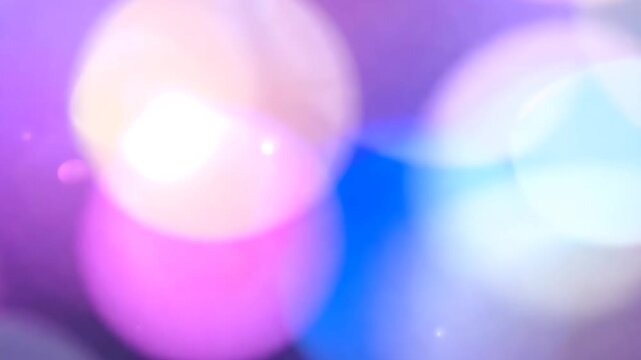 Abstract Purple and Blue Booker Lights Background with Soft Refocused Circles