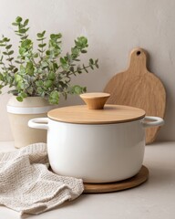 Modern pot with wooden lid on neutral kitchen background, studio lighting, clean and elegant setup