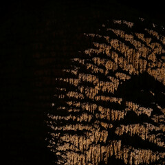 formation of a sinter limestone wall illuminated by warm light