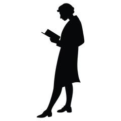 silhouette of a person standing and reading a book