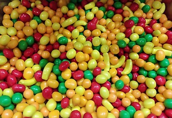 Colorful candies shaped like fruit. Sweets, treats.