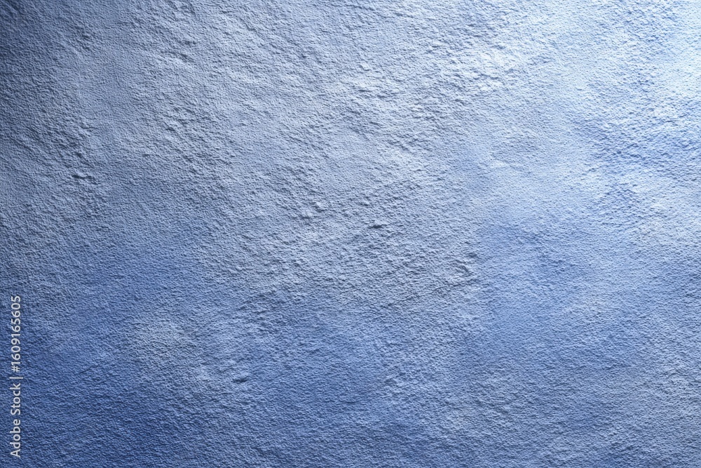 Poster textured surface with a gradient of light to dark blue appearing rough and uneven