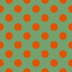 A pattern of evenly spaced orange circles covers a muted green background, creating a grid-like arrangement. Each circle is identical in size and uniformly distributed.