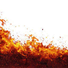 Flames rise dramatically with sparks flying in a powerful display of fire energy at a controlled burn site in the forest