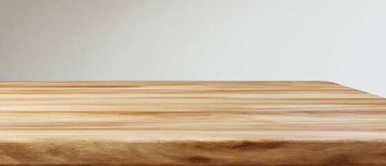 Fototapeta premium The sleek wooden table showcasing natural textures in a minimalist setting.