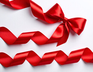 A shiny red satin ribbon bow, perfect for a festive gift, Christmas decoration, or Valentine's Day present, isolated on a white background