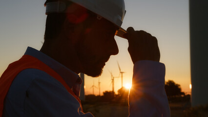 Fototapeta premium Technician Men Putting The Helmet 
