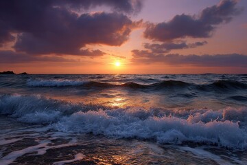 Waves crash on a shore under a vibrant sunset with clouds