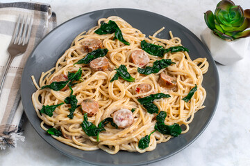 chicken sausage alfredo  with sauteed  spinach