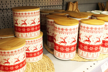 red and white mug on a shelf in a hypermarket store. Christmas souvenirs