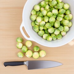 Fresh Brussels Sprouts in Bowl with Knife