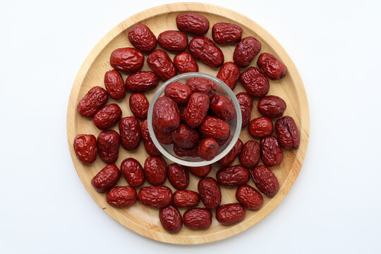 Top view Natural sweet dried jujube in a glass cup. Healthy fruit