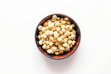 Dried seeds in a patterned bowl