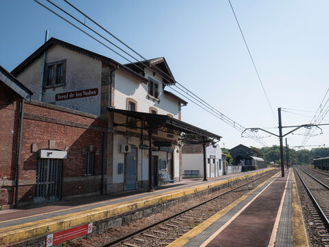 Toral de los Vados, Leon, Spain, 06-16-2025: The passenger building at Toral de los Vados station is completely empty in the morning, next to the platform and a platform located outside