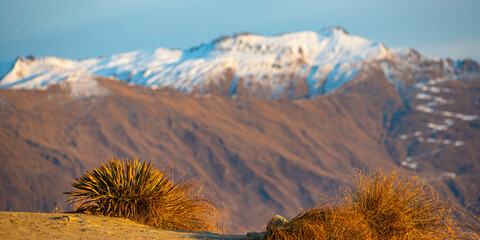 powerful mountain ranges, snow covered peaks of Southern Alps seen from Roys Peak Track near...