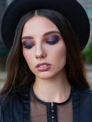 Close-up portrait of beautiful young girl with closed eyes