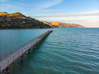Aerial view of Governors Bay jetty near Lyttelton, Banks Peninsula, South Island, New Zealand, with...