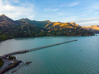 Aerial view of Governors Bay jetty near Lyttelton, Banks Peninsula, South Island, New Zealand, with...