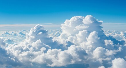 Fluffy Cotton Clouds in Blue Sky