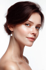 Elegant Portrait of a Beautiful Woman with Diamond Earrings – Clean White Background Studio Photography