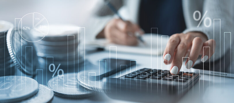 Finance, banking and investment, Asset allocation, budget management. Business woman calculating financial report, cost control and budgeting. Tax and budget planning - Powered by Adobe