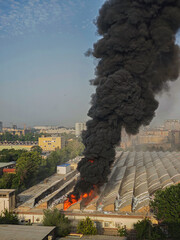 Warehouse Fire with Smoke and Flames – Industrial Disaster, Explosion Risk