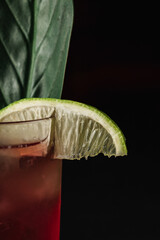 Lime Garnish on Cocktail Glass