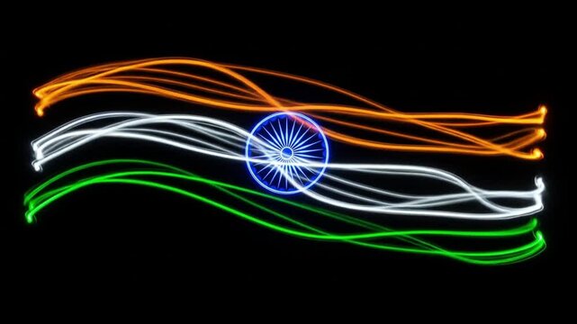 Light painting of the Indian flag with saffron, white, and green stripes, and a blue chakra in the center, against a black background.