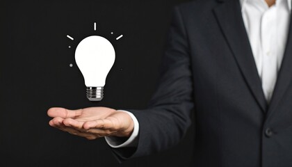 3D scene with a lightbulb-shaped idea icon floating above the hand of a blurred man in a suit