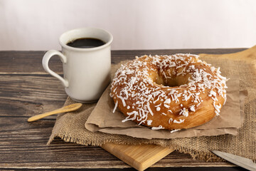 Traditional breakfast with sweet pastry and warm drink