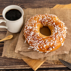 Traditional breakfast with sweet pastry and warm drink