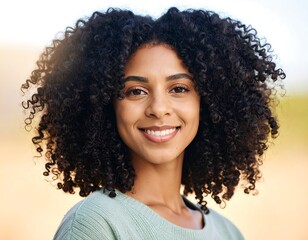 Portrait of a beautiful smiling African American woman with curly hair