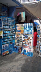 Fototapeta premium Colorful magnets on display in front of a shop in the medina in Chefchaouen, Morocco