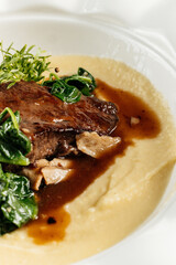 Braised Beef with Mashed Potatoes and Greens
