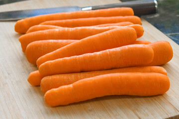 Carrots on cutting board. Healthy and dietary food concept.