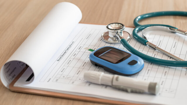 Diabetes, glucose testing record, blood sugar level test, glucometer, doctor's stethoscope medical equipment, clipboard background with patient health check exam or diagnosis
