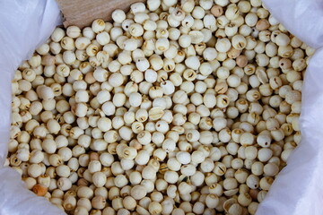 soy beans in wooden spoon