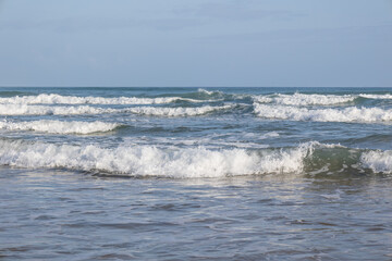 Waves of the sea arriving on the beach.