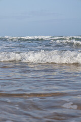 Waves of the sea arriving on the beach.