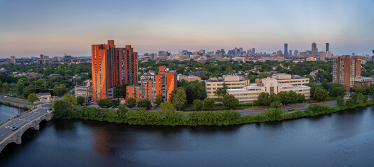 Boston skyline, Charles River, and buildings at sunset.