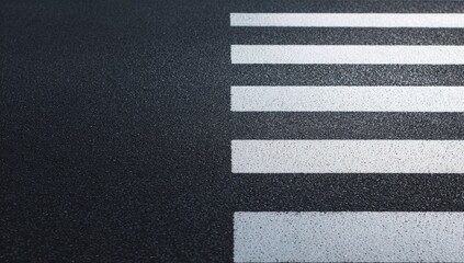 Fototapeta premium Wet pavement with pedestrian crossing