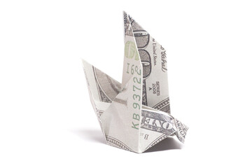Origami Bird made from a hundred-dollar bill on a white background.