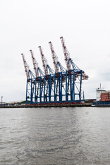 Tall cranes in the port of Hamburg, Germany