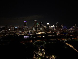 Obraz premium Beautiful Austin skyline at night with a stunning aerial drone view