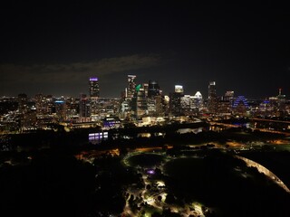 Obraz premium Beautiful Austin skyline at night with a stunning aerial drone view